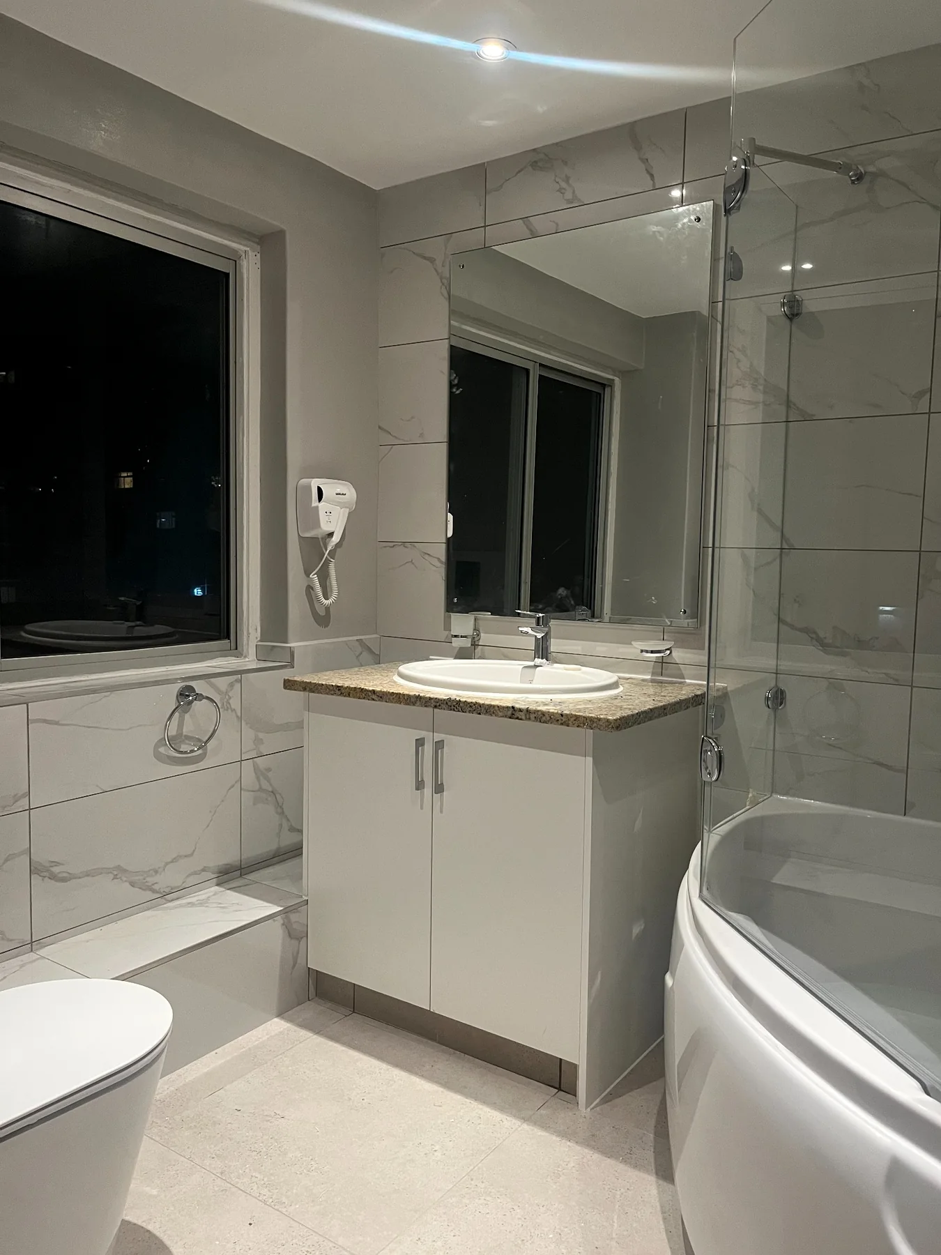 Completed hospitality bathroom renovation view 1